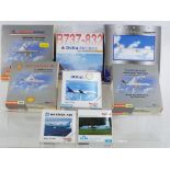 Herpa - a collection of eight boxed model aircraft in various scales,