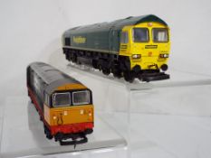 Model Railways - two diesel OO gauge locomotives by Lima and Hornby, #66527 in Freight Liner livery,