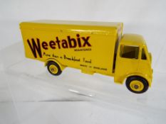 Dinky Toys - a Guy van Weetabix, # 514, 1st type cab with yellow cab, body and ridged hubs,