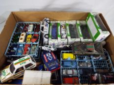 Corgi - a collection of approx fourteen boxed diecast model motor vehicles and six trays of unboxed