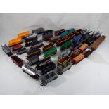 Model Railways - a box containing approx 43 OO gauge wagons in good to excellent condition