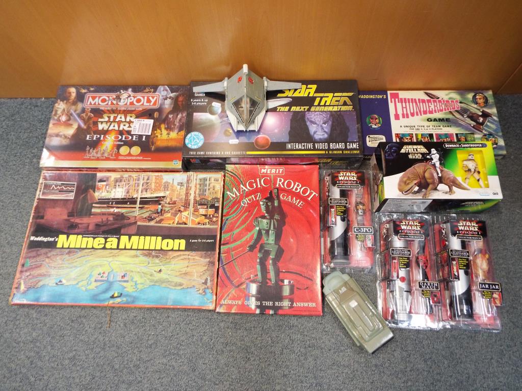 A good lot to include three vintage board games comprising Thunderbirds Game by Waddingtons,