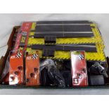 SCX - a collection of slot car track and accessories in good to excellent condition.