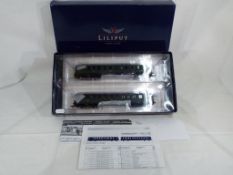 Model Railways - a Lilliput HO scale two-car diesel/electric rail car set in German DR green livery,