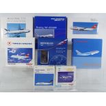 Herpa - a collection of eight boxed model aircraft in various scales,