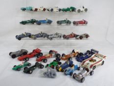 Dinky - twenty six unboxed diecast racing cars, good to excellent,