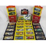 Lledo - 32 diecast model vehicles in original window boxes, appear to be in mint condition,