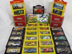 Lledo - 32 diecast model vehicles in original window boxes, appear to be in mint condition,