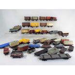 Model Railways Hornby OO gauge - in excess of 40 unboxed wagons in playworn condition.