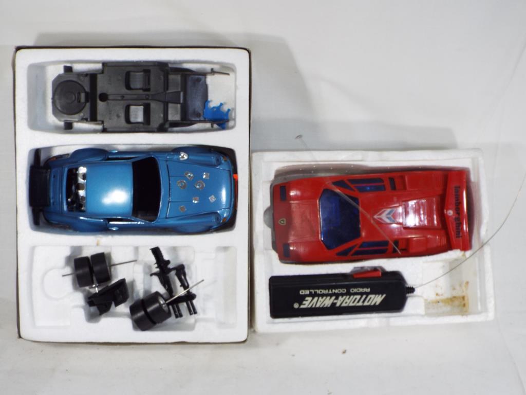 Two boxed cars, one a radio controlled Lamborghini Countach and the other a Burago Porsche 911, - Image 2 of 2