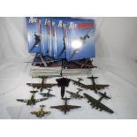 Orbis and De Augustina - a collection of aviation items comprising twelve diecast planes, unboxed,