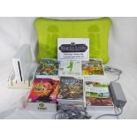 Nintendo Wii - a collection of Nintendo Wii items to include a console with power adapter,
