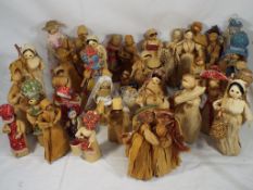 A collection of 40 unboxed corn husk dolls in good to excellent condition,