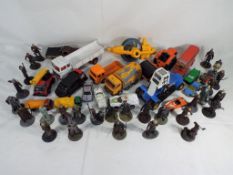 Two baskets containing 46 diecast vehicles and figures, eighteen unboxed diecast vehicles by Corgi,