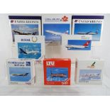 Herpa - eight 1:500 scale boxed planes comprising 501040, 501002, 506328, 500883, 500746, 503747,