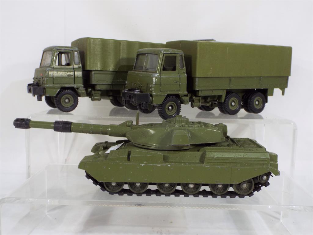 Dinky - three unboxed Army diecast model motor vehicles, two Foden trucks and a Chieftain Tank,