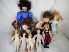 Eleven modern dolls,