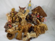 A collection of 40 unboxed dolls, predominantly made of corn husk also some wicker,