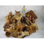 A collection of 40 unboxed dolls, predominantly made of corn husk also some wicker,