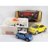 Burago - two 1:18 scale diecast model motor vehicles including a Gold Collection Porsche 911,