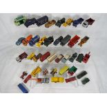 Lesney - a box containing approx 40 diecast model motor vehicles in good playworn condition Est £30