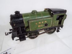 Model railways - an O gauge Hornby by Meccano special tank locomotive op no 8123, green LNER livery,