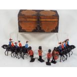 Britains and Lone Star - Fourteen lead and plastic soldiers, mainly on horseback,