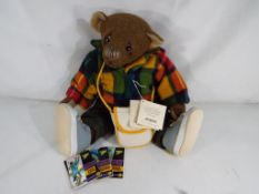 Harris Tweed - A pure hand crafted Harris Tweed bear entitled Oscar with bag containing his pocket