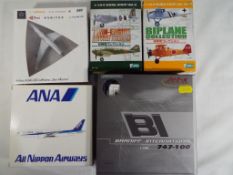 Herpa, Schabak and others - five boxed diecast airplanes 1:144 scale,