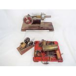 Four scratch built horizontal miniature steam pumps two on wooden plinths the other on a metal