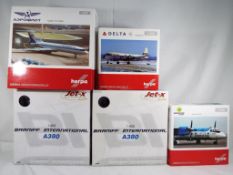 Herpa and Dragon - five boxed diecast airplanes 1:200 and 1:400 scale comprising JX054, JXM130,