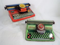 Mettoy - two child's tin-plate Typewriters,