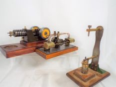 Two scratch built horizontal miniature steam pumps on plinths approx 17cm (l) and 15cm (l),