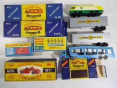 Matchbox - nine diecast vehicles and accessories, five in original boxes and four unboxed,