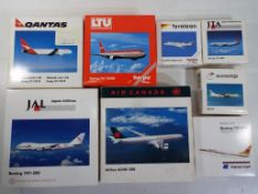 Herpa - eight boxed diecast airplanes in 1:500 scale comprising 508018, 501286, 511117, 511186,