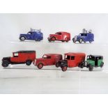 Dinky - seven unboxed diecast commercial vehicles, comprising an Austin Taxi, two Royal Mail vans,