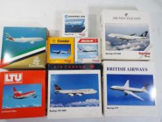 Herpa - eight boxed diecast airplanes in 1:500 scale comprising 501682, 511155, 500500, 501828,