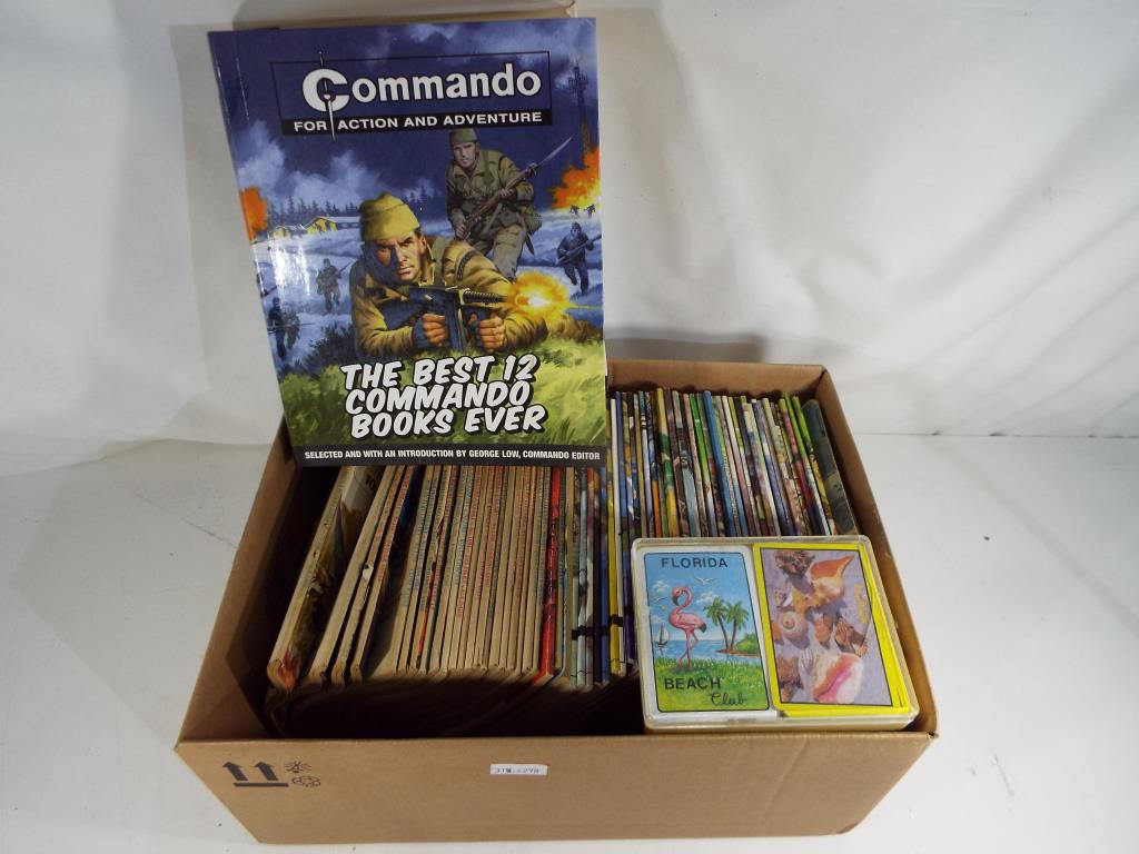 Comics - Sixty three Commando Comics and one Commando book,