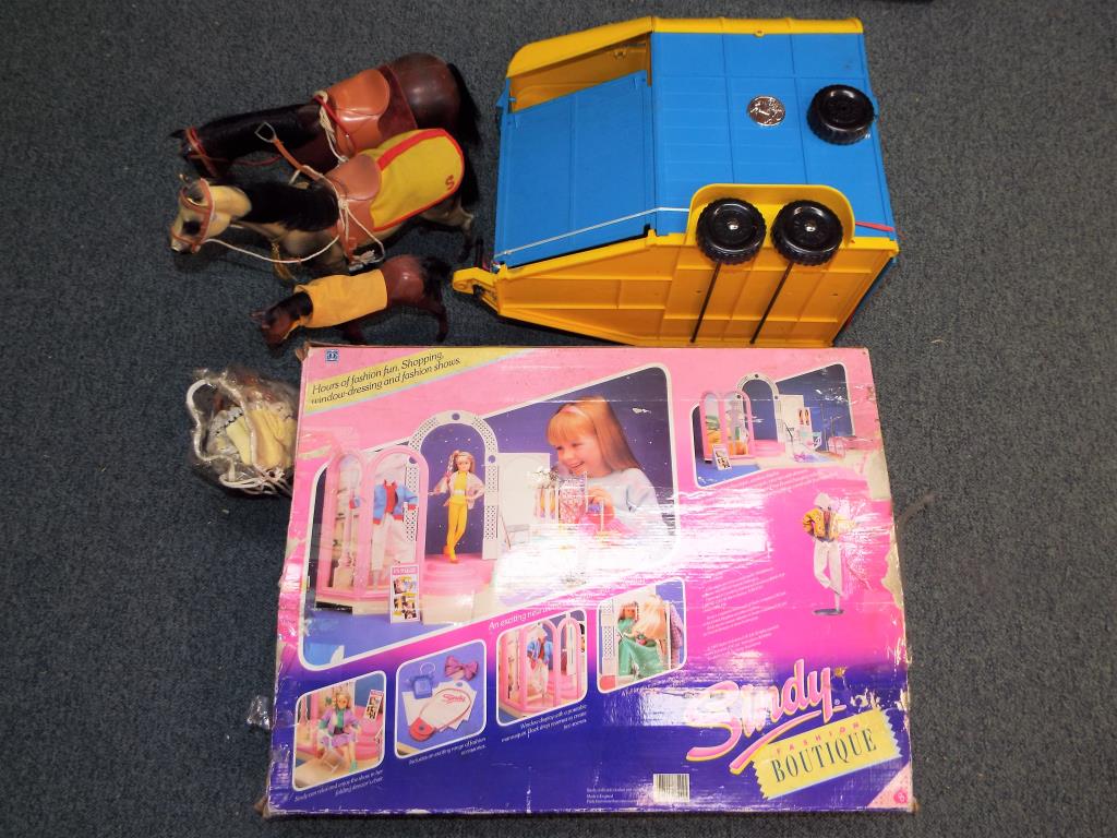 Sindy - a Sindy Boutique in original box and an unboxed Sindy Horsebox with three horses,