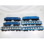 Model Railways - three battery operated Tri-ang O gauge Blue Flyer diesel locomotives with three