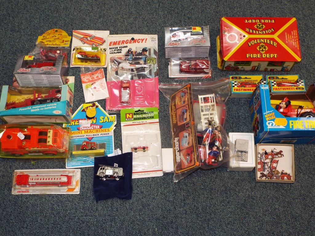 Schuco and others - In excess of twenty diecast vehicles in original boxes and blister packs