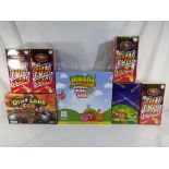 Lot to include a box of Moshi Monsters Bubble Wands, a box of Sure Shot paper roll caps,