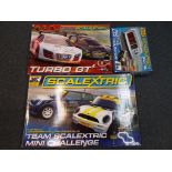 Scalextric - three sets comprising 1:64 scale turbo GT set,