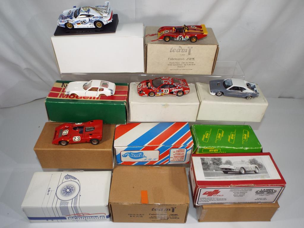 Dannino, Gamma and others - twelve white model kits of Ferraris, some assembled, boxes G,