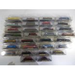 Model Railways - approximately 30 N gauge model trains by Del Prado in original packaging to