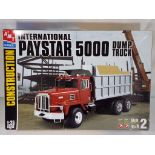 AMT - International Paystar 5000 dump truck in original G box contents appear to be in near mint