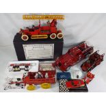 Solido and others - Ten cast iron, pottery and diecast fire vehicles in original boxes,