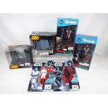 Action Figures - two Star Wars action diecast ships to include two Darth Vader Tie Fighters,