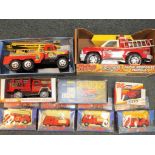 Nine models of fire fighting vehicles contained in original boxes to include Tonka, Nylint, Titan,