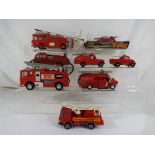 Dinky - A collection of unboxed, playworn Dinky Toys and Dinky Supertoys models of fire vehicles.